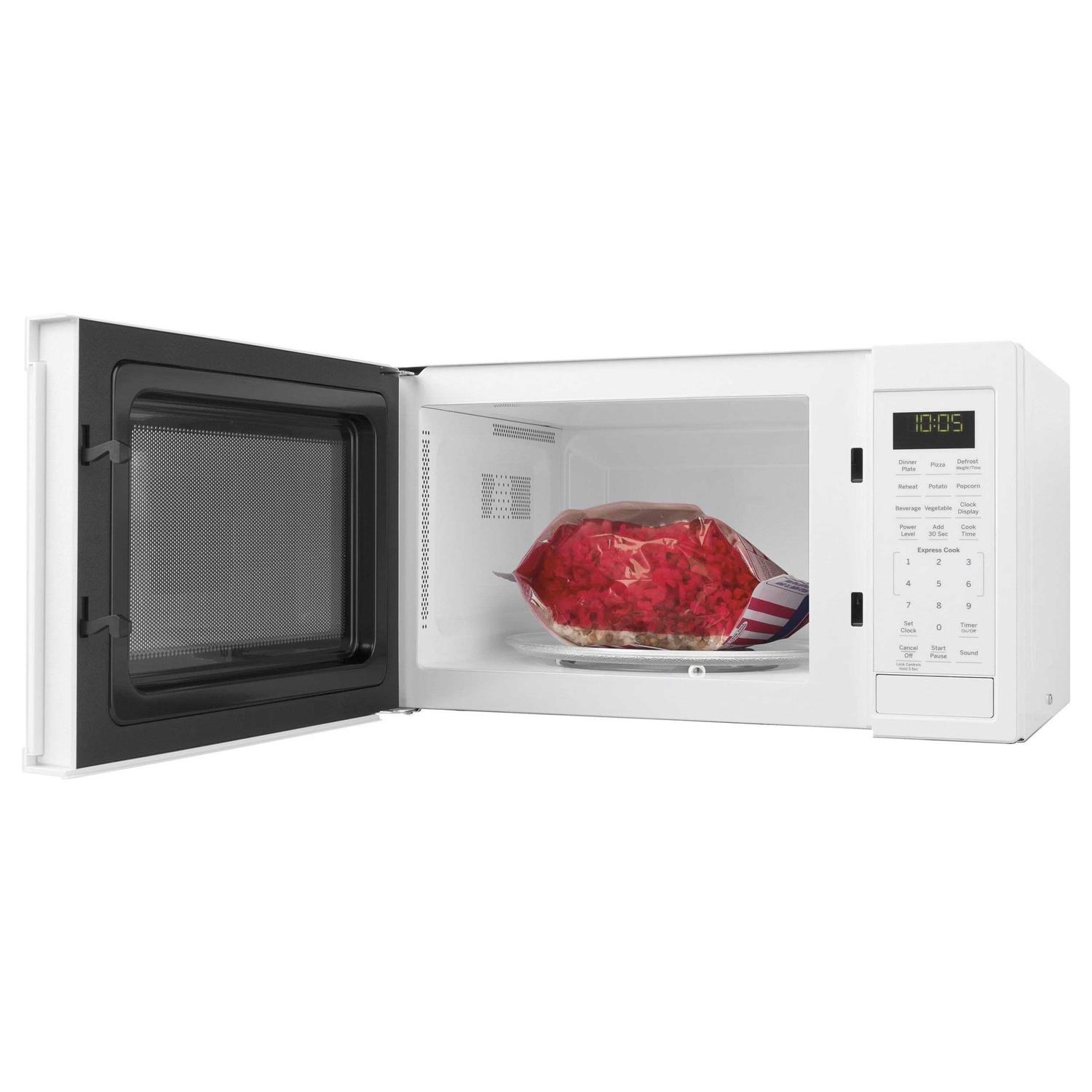 GE 0.9 Cu. Ft. Countertop Microwave - Image 5