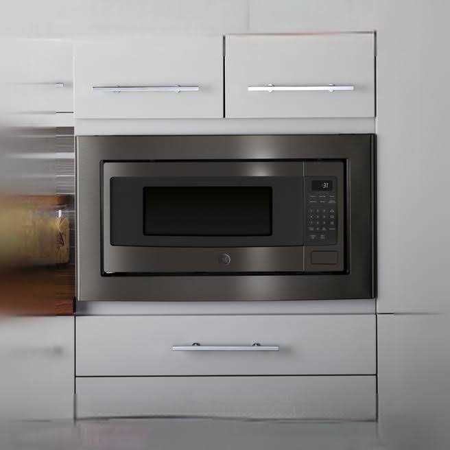 GE 1.1 Cu. Ft. Capacity Countertop Microwave Oven - Image 5